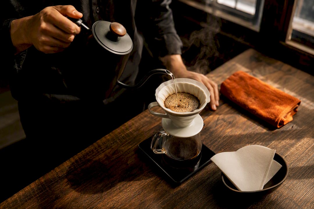 Brewer judging hot water for coffee